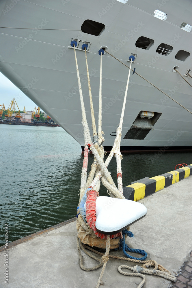Fototapeta premium Cruise tourist ship and bollard in port of Odessa, Ukraine