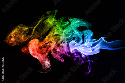 Colorful creative smoke waves on black background