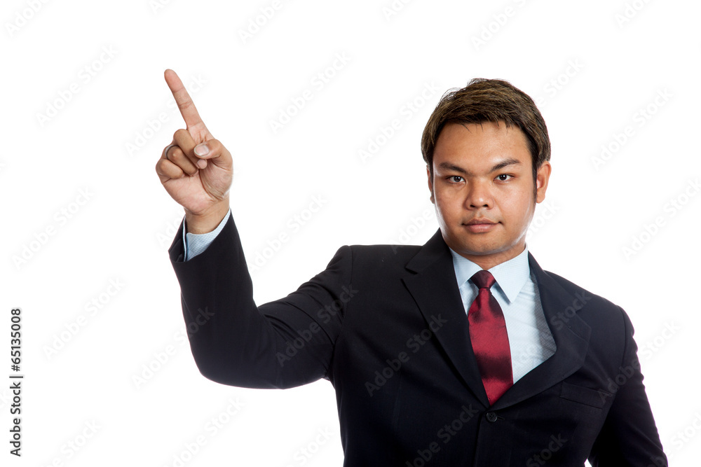 Asian businessman in suit point up look at camera Asian businessman in suit point up look at camera