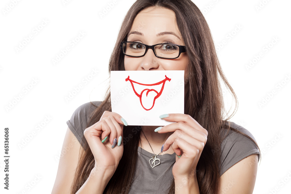 happy and smiling girl with a smile painted on paper happy and smiling girl with a smile painted on paper