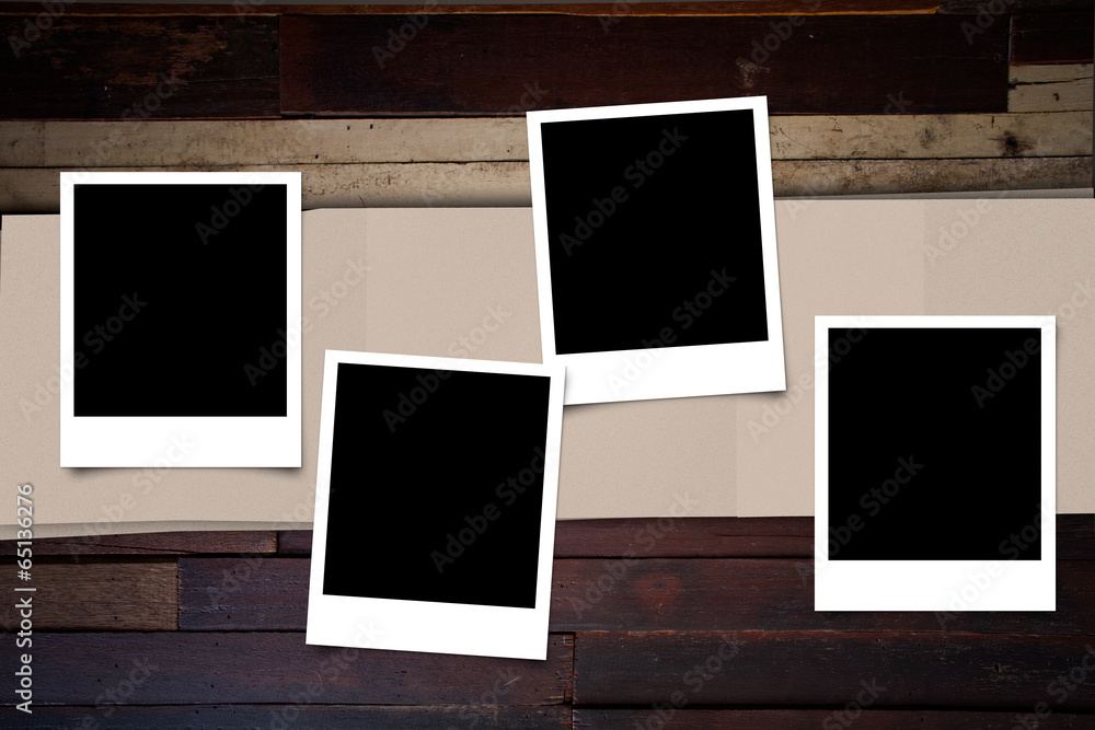 Polaroid photo frame on wood background for decoration Polaroid photo frame on wood background for decoration