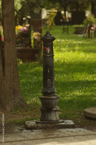 tap on the cementary - water