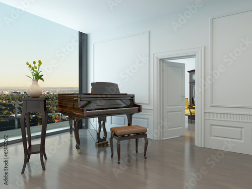 Grand piano standing in nice white room photo