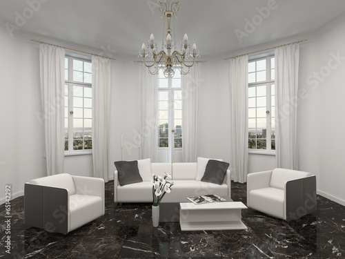 Living room with bay window, chandelier and couch photo