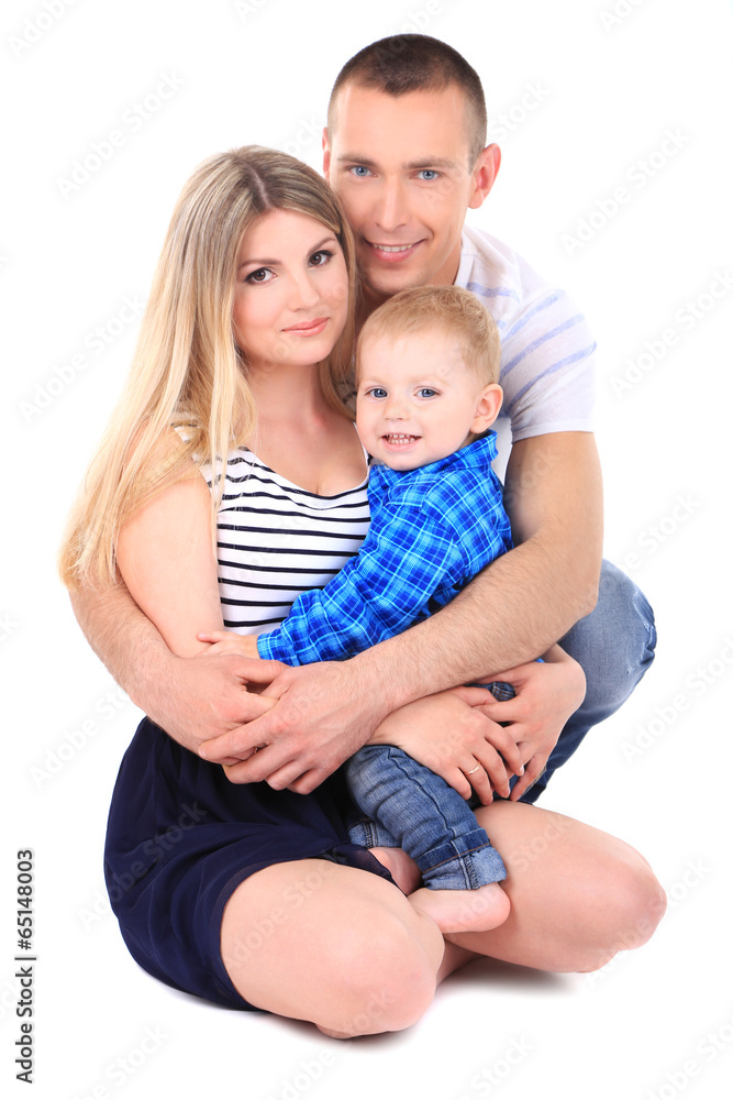 Happy young couple with small baby isolated on white