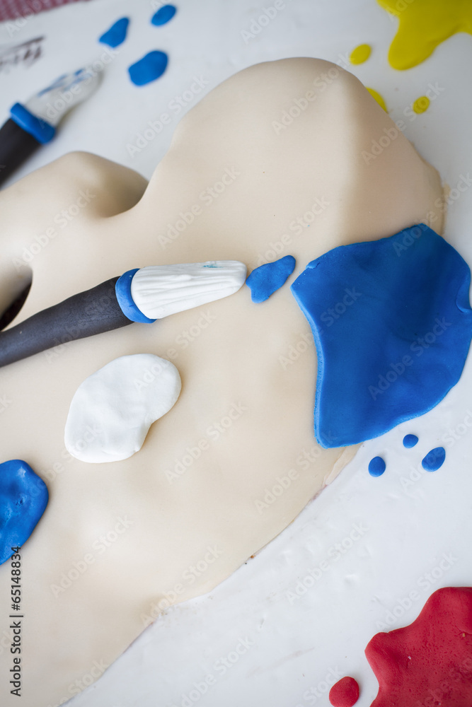Naklejka premium Cake imitating a painter's palette