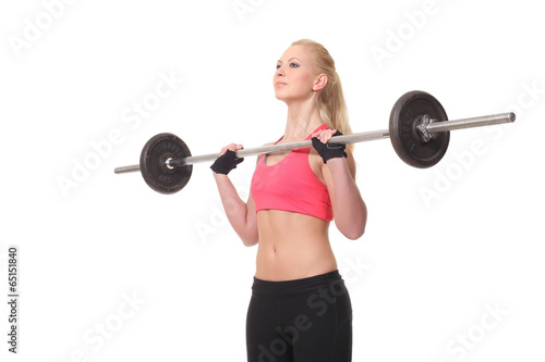 beautiful sports fitness girl with a barbell