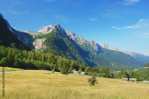 Maloja Pass, view of the valley and the dam on rock, Swiss Alps