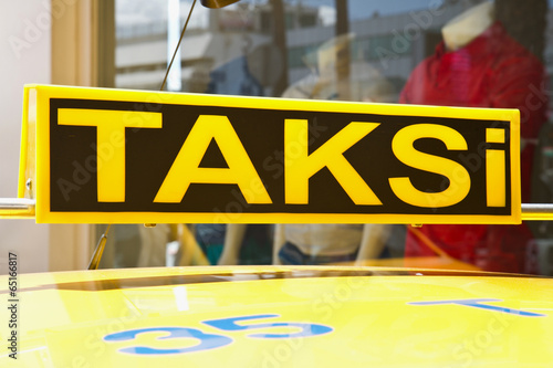 Yellow sign of the Istanbul taxi, Turkey photo