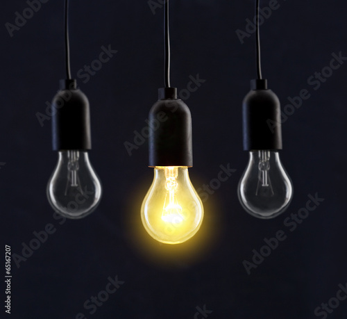 Light bulb lamps on black background