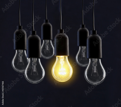 Light bulb lamps on black background