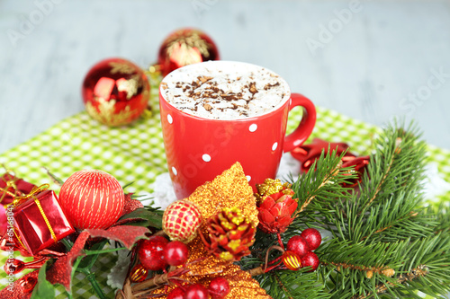 Hot chocolate with cream in color mug,