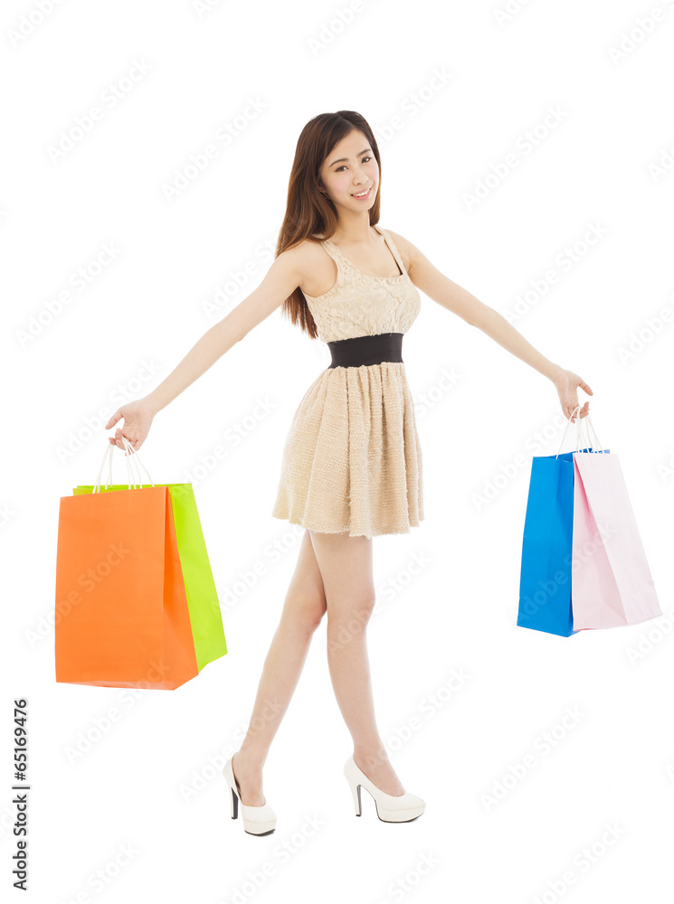 beautiful young woman with shopping bags