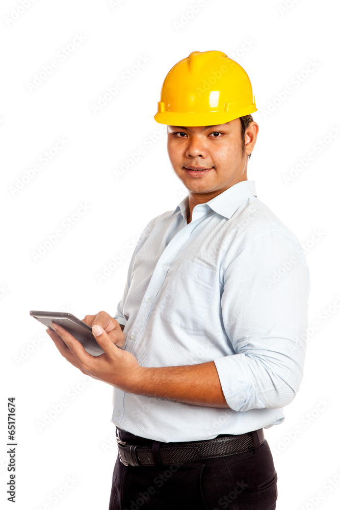 Asian engineer man use his tablet and smile look at camera Asian engineer man use his tablet and smile look at camera