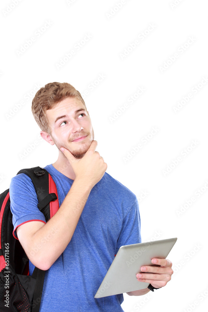 Thoughtful male student portrait using tablet Thoughtful male student portrait using tablet