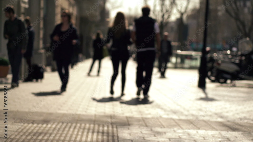 Silhouette of people walking in the city, super slow motion Silhouette of people walking in the city, super slow motion