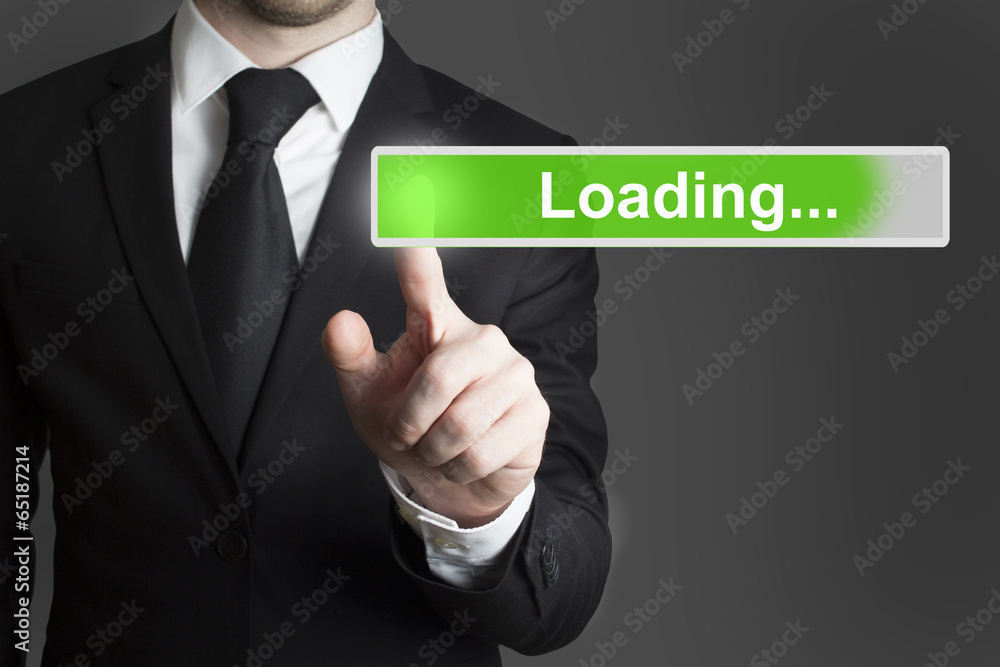 businessman in suite pressing touchscreen recharge businessman in suite pressing touchscreen recharge