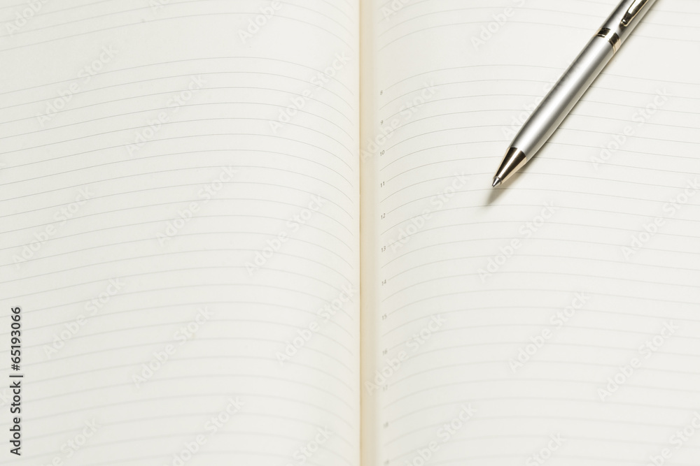 pen and open notepad