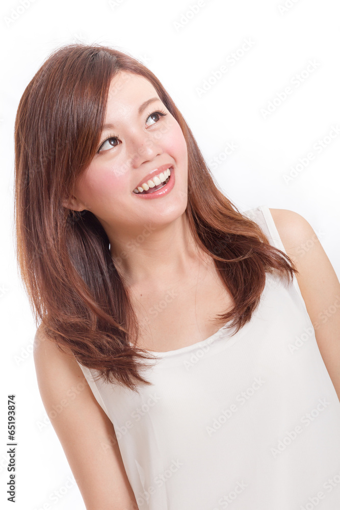 Happy Malaysian woman in white dress looking up Happy Malaysian woman in white dress looking up
