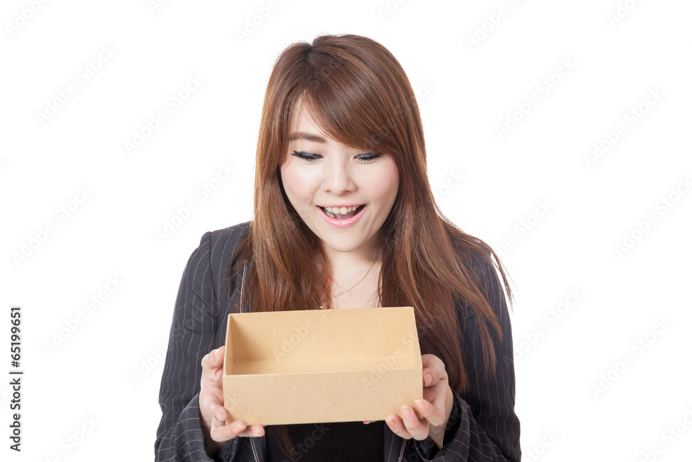 Asian Businesswoman surprise look inside a box Asian Businesswoman surprise look inside a box