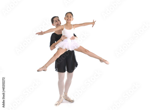 little girl ballerina learning dance lesson with ballet teacher