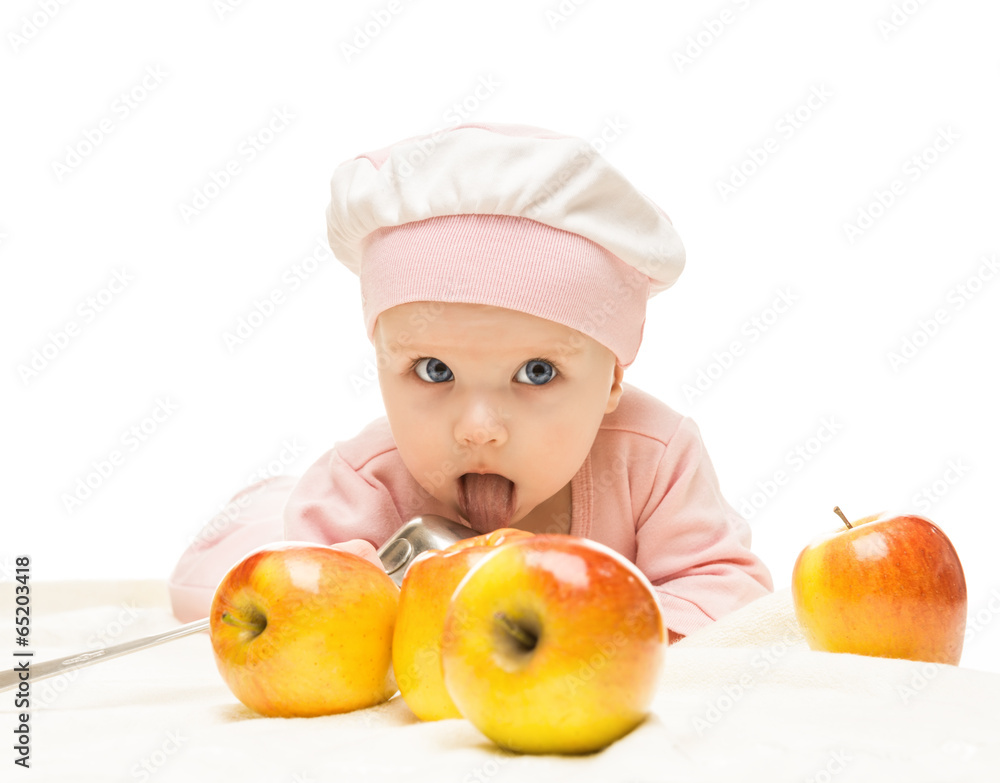 Little baby is looking into the camera and apple Little baby is looking into the camera and apple