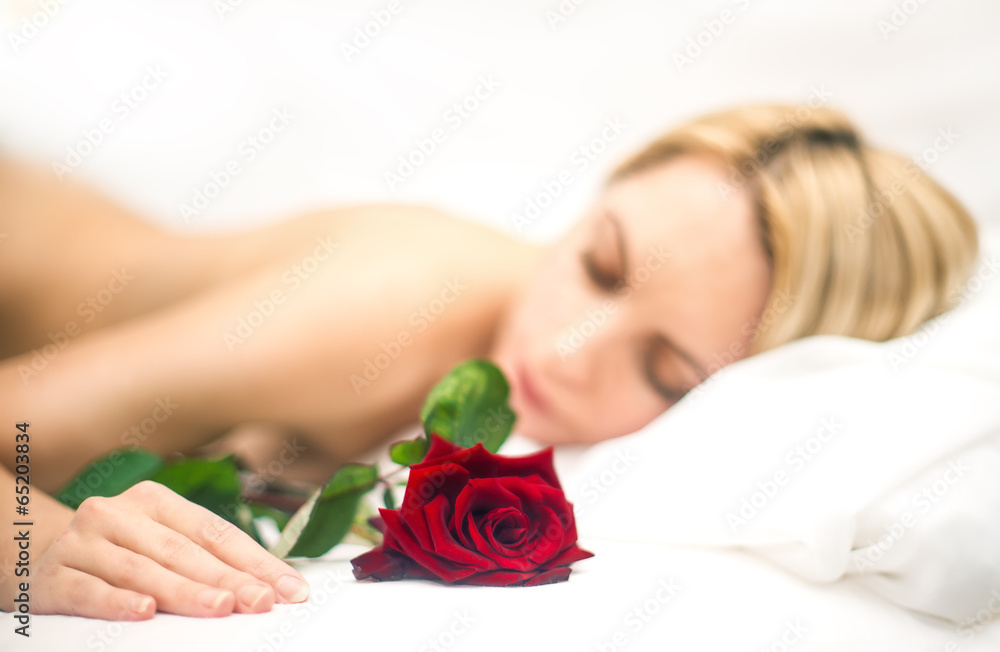 Portrait of young sleeping woman with rose Portrait of young sleeping woman with rose