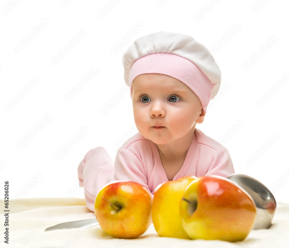 Little baby is looking into the camera and apple Little baby is looking into the camera and apple