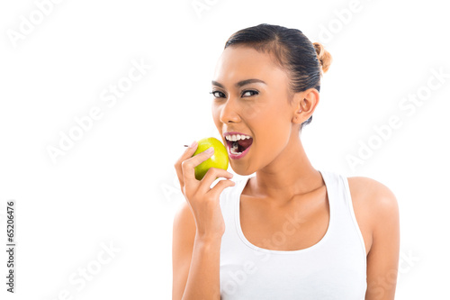 Asian woman eating and living healthy