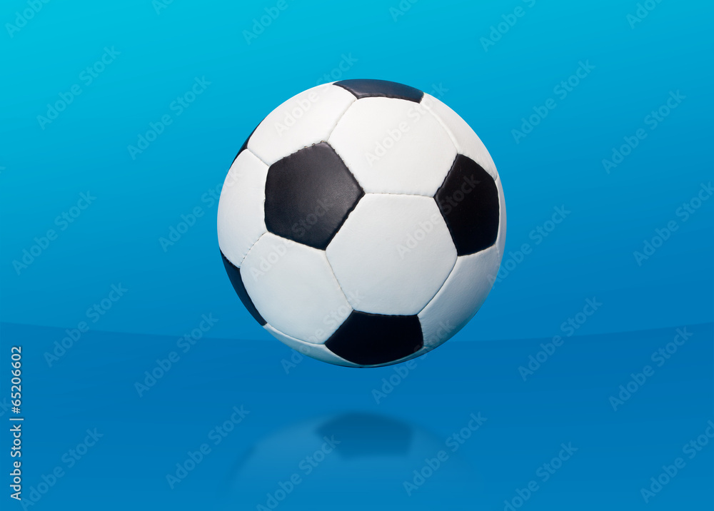 Soccer ball over blue