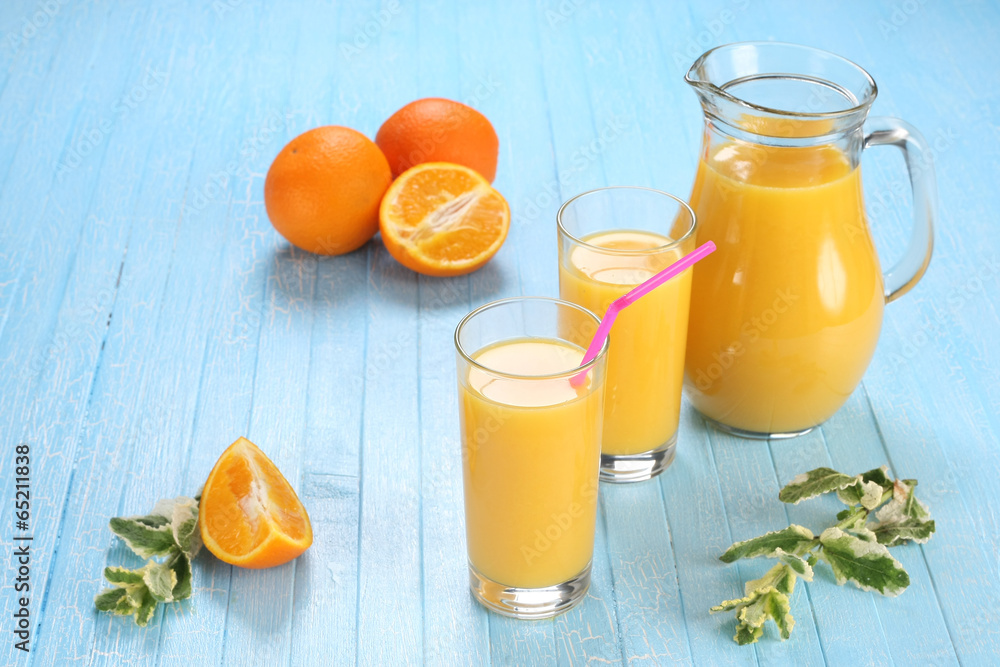 Glass and jug of orange juice Glass and jug of orange juice