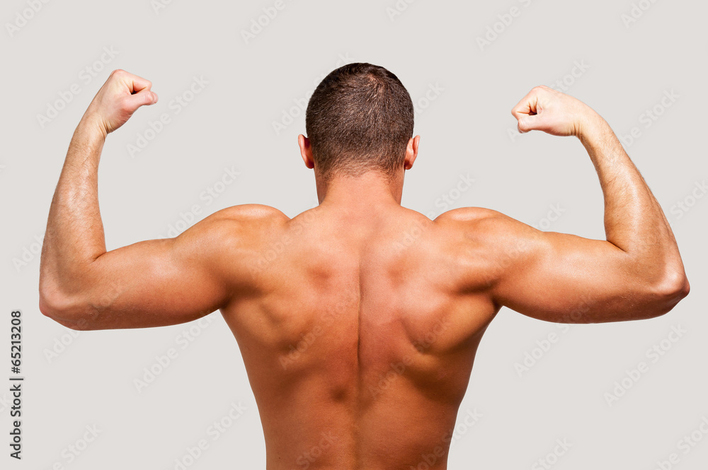 Showing his perfect muscles. Showing his perfect muscles.
