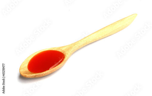 chili sauce in the spoons