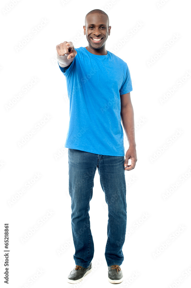 Casual middle aged man pointing at you Casual middle aged man pointing at you