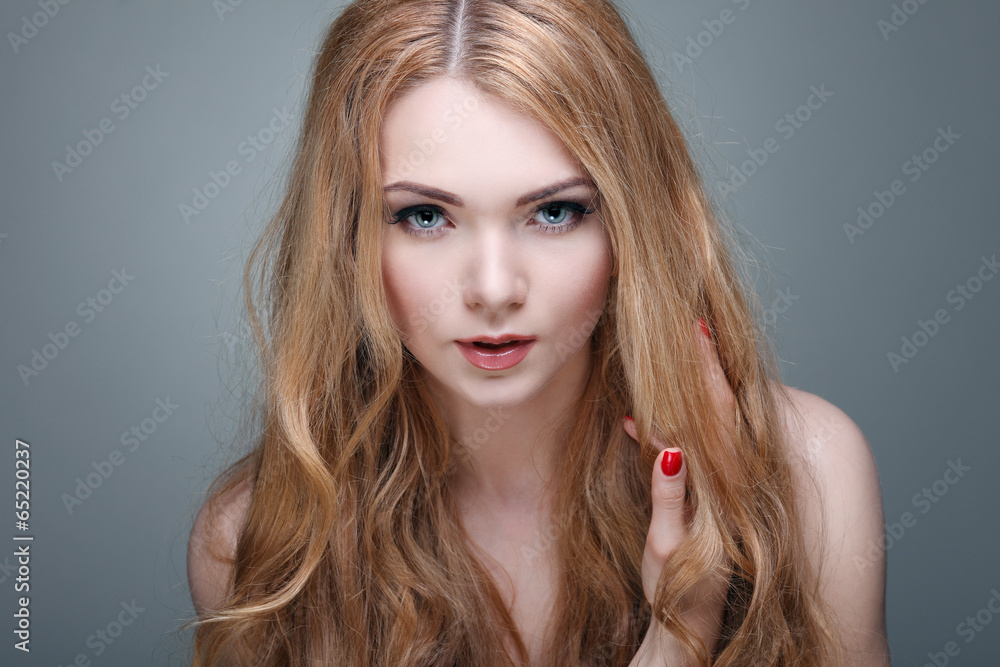 Beautiful girl, isolated on a light - grey, emotions, cosmetics Beautiful girl, isolated on a light - grey, emotions, cosmetics