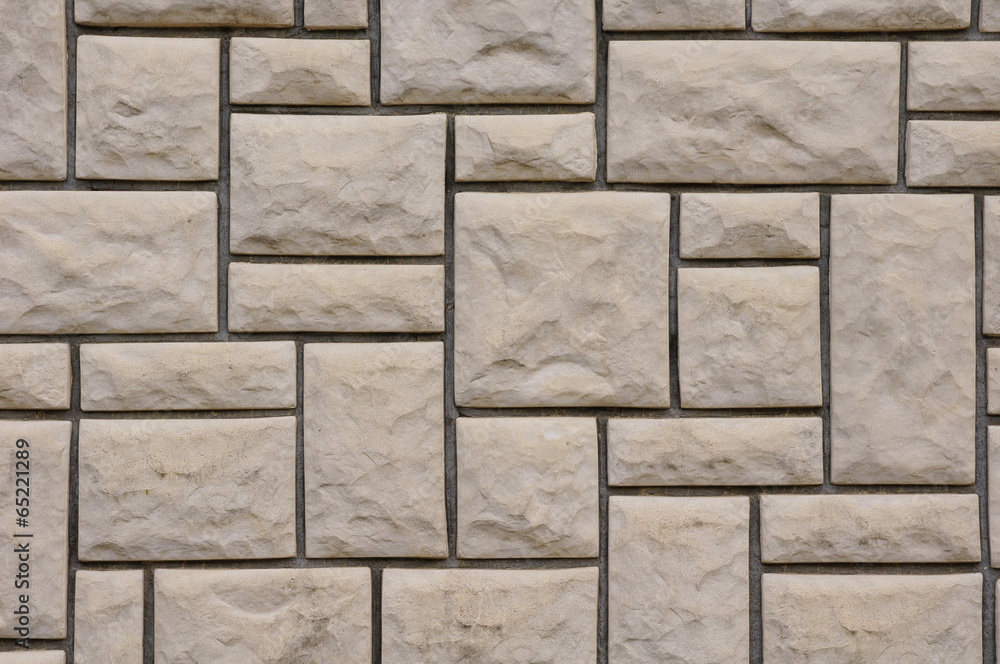 Naklejka premium Wall lined with stone slabs