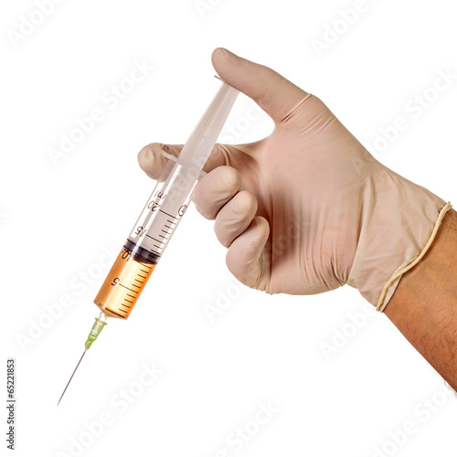Hand holding medical needle