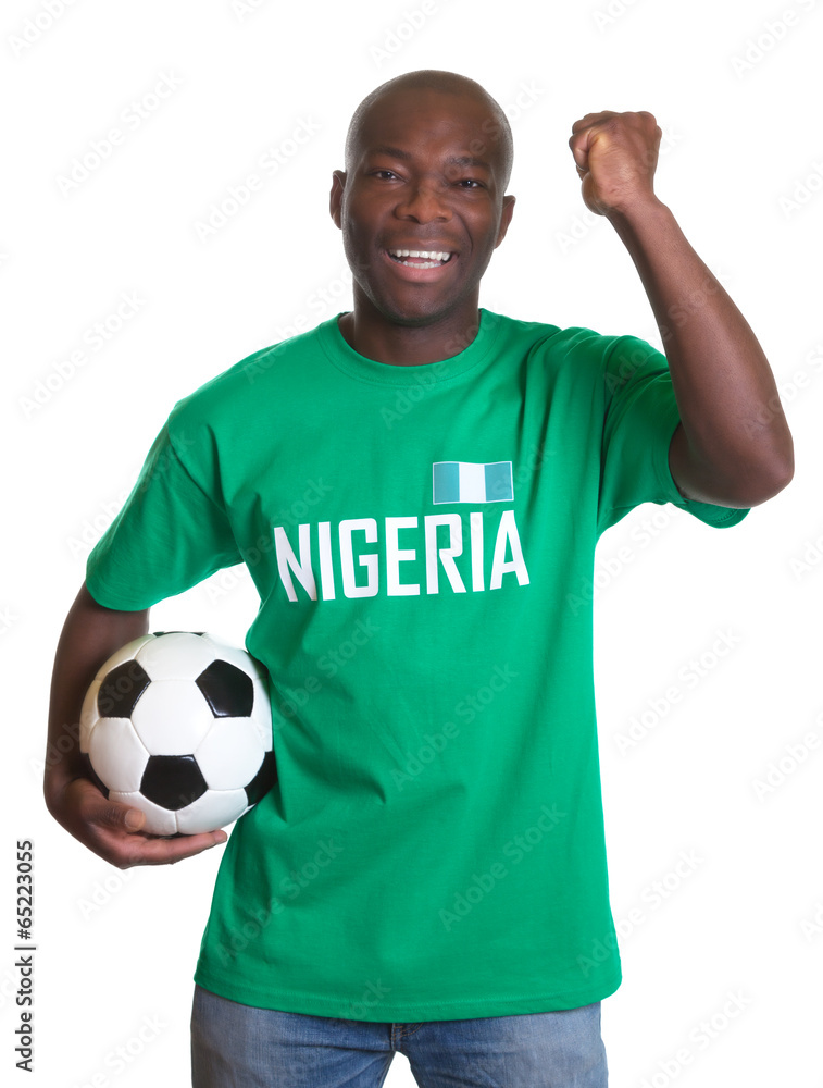 Cheering soccer fan from Nigeria with ball Cheering soccer fan from Nigeria with ball