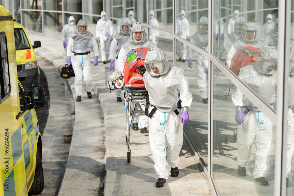 Biohazard medical team walking to building