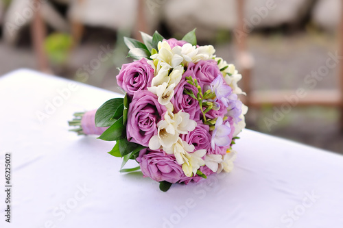 Bridal bouquet of purple roses