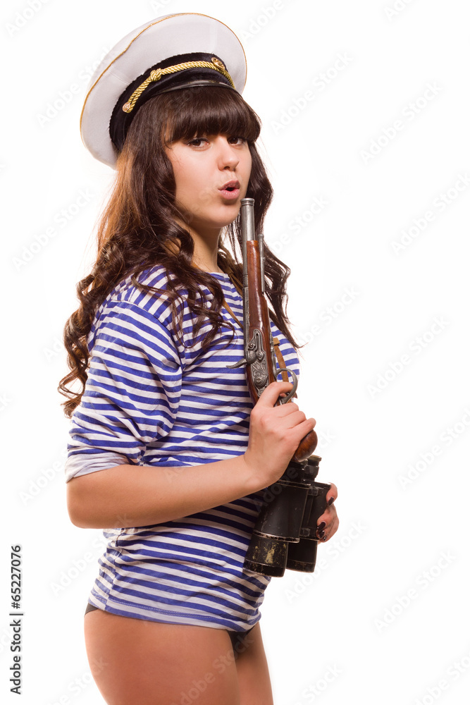 Beautiful woman sailor in pinup style with pistol Beautiful woman sailor in pinup style with pistol