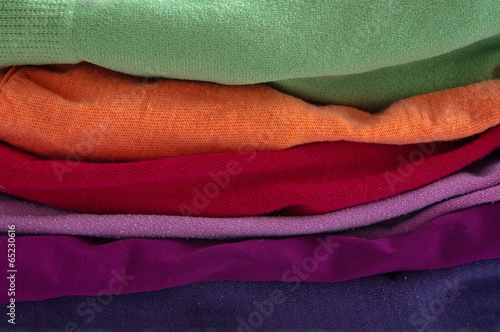 Batch of colorful clothes, different colorful fabrics