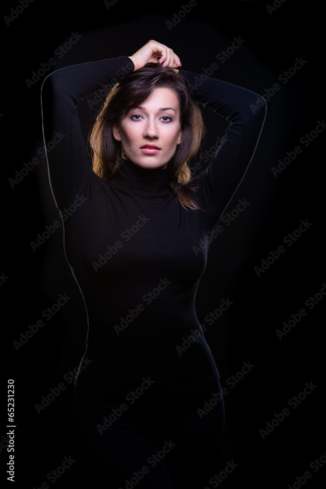 beautiful young woman on a black background beautiful young woman on a black background
