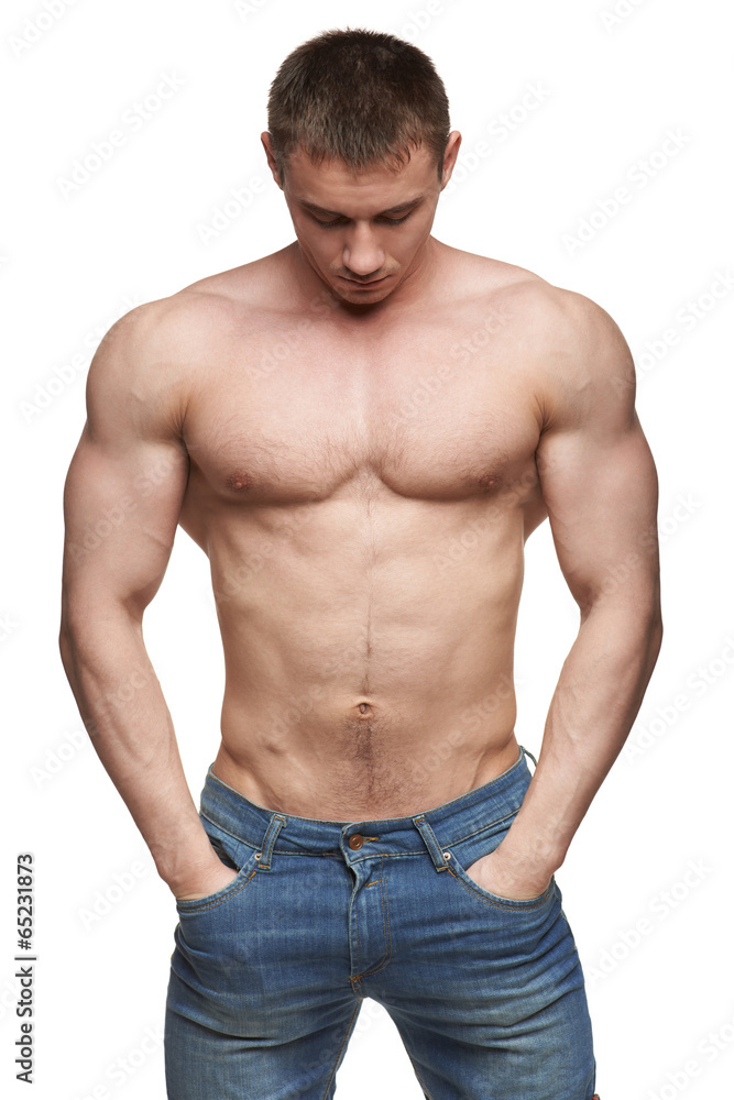 Muscle man posing in studio