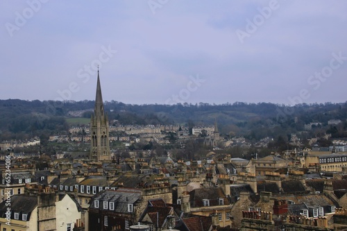 View of the cities rooftops and chimneys. photo