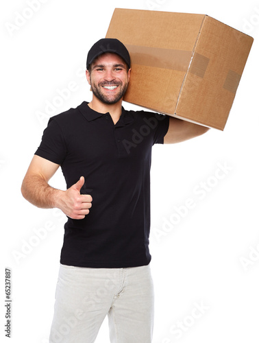 Smiling delivery man giving cardbox photo