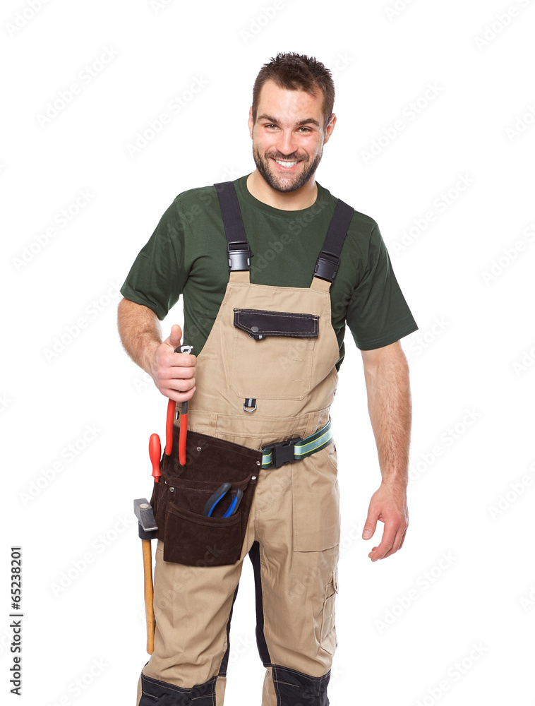 Portrait of smiling worker in brown uniform with tools Portrait of smiling worker in brown uniform with tools