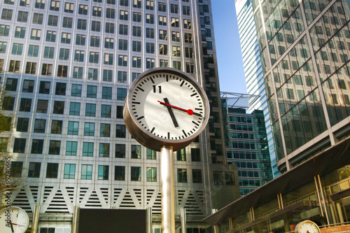 Clock on the Canary Wharf square, London photo