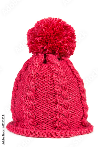 Knitted hat with a pompon