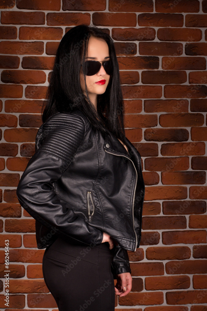 Pretty sexy brunette woman in leather jacket Pretty sexy brunette woman in leather jacket